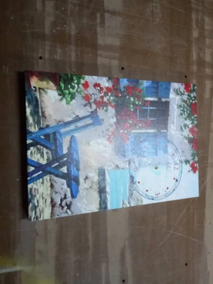 Mavi Sandaye Masa Çiçekli Ev ve Manzaralı Kanvas Tablo